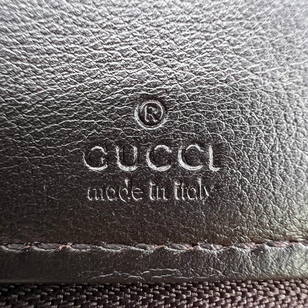 Gucci Guccissima Metal Bar Zip Around Wallet W22657