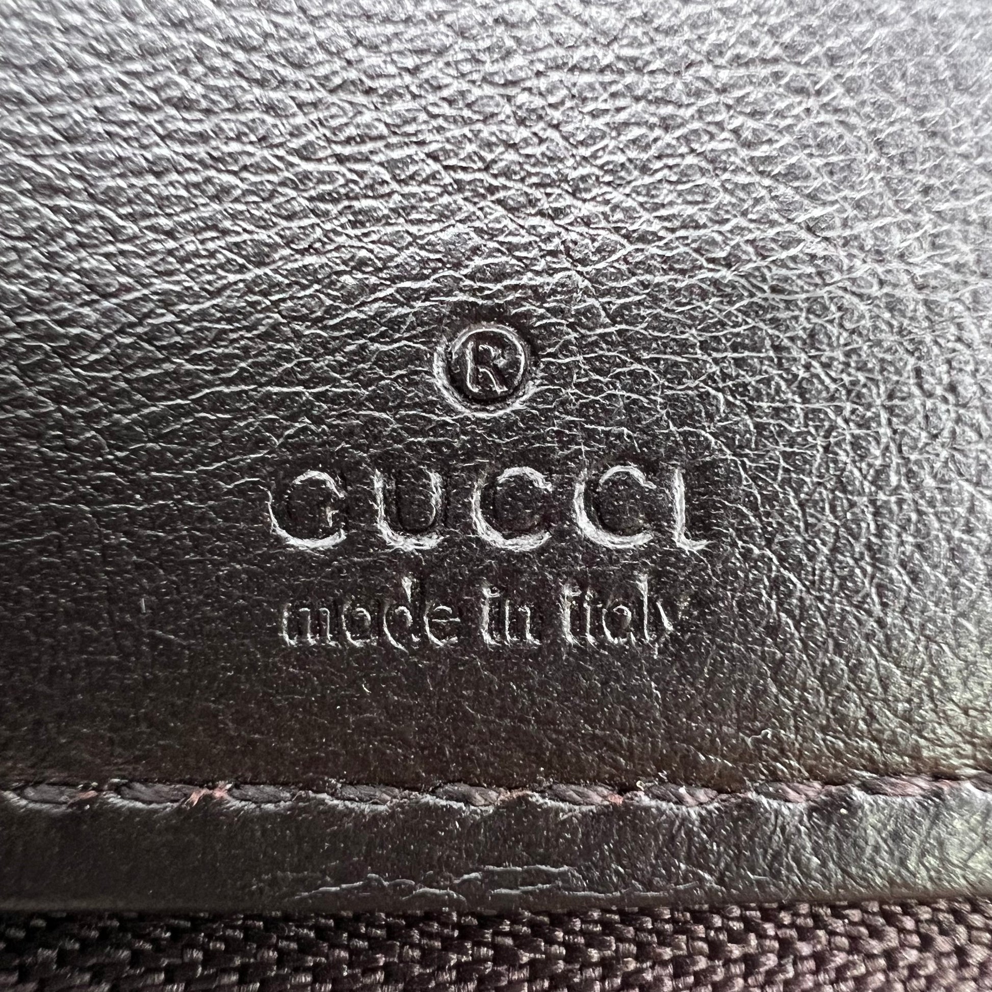 Gucci Guccissima Metal Bar Zip Around Wallet W22657