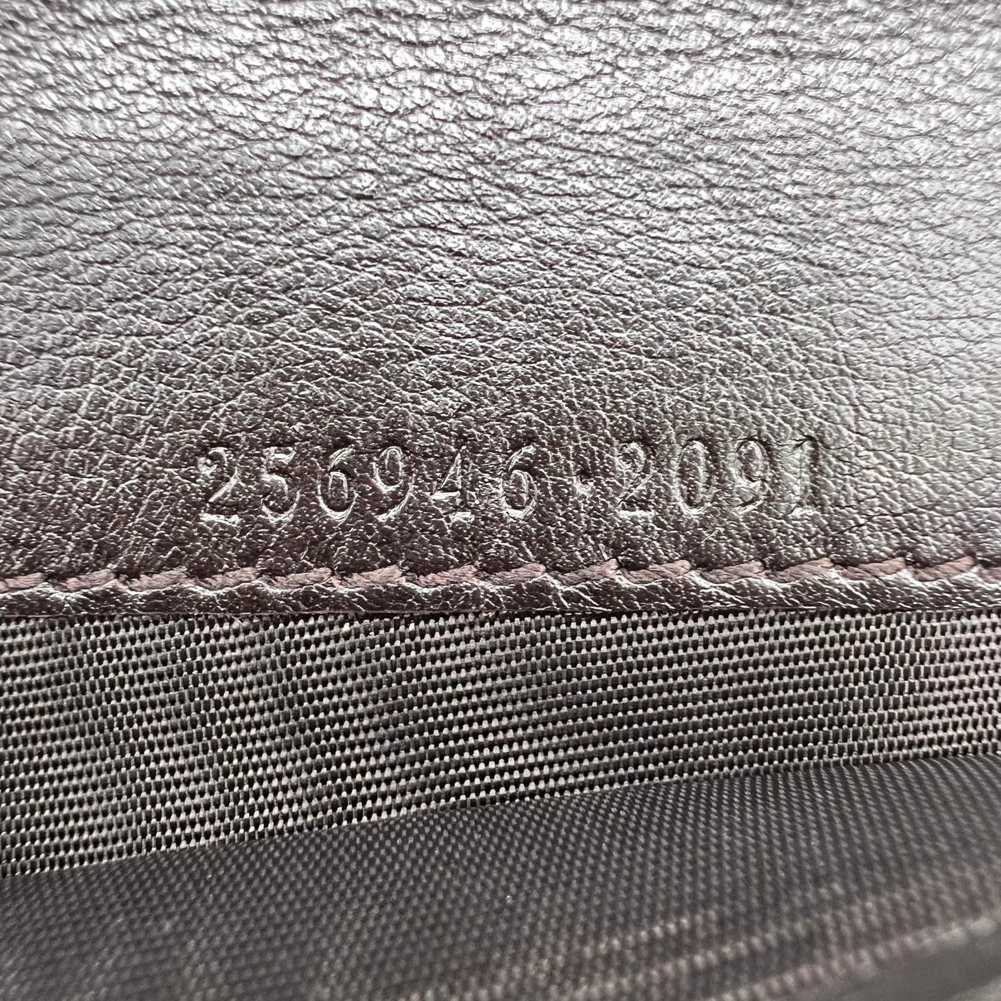 Gucci Guccissima Metal Bar Zip Around Wallet W22657