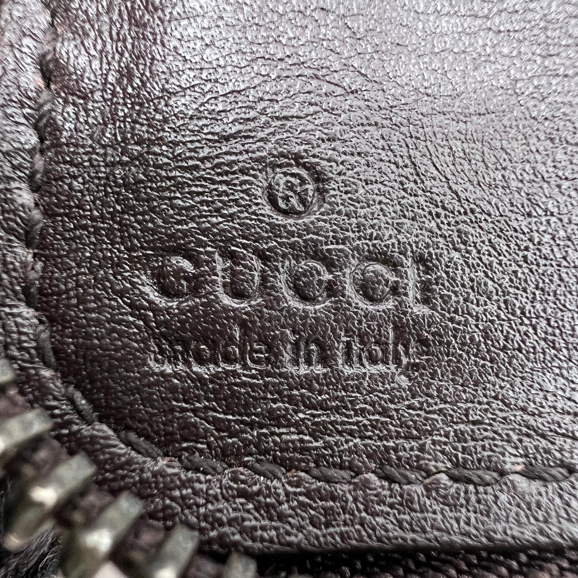 Gucci Guccissima Leather Zip-Around Wallet W22658