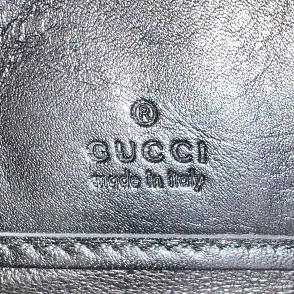 Gucci Guccissima Metal Bar Zip-Around Long Wallet in Black Calfskin Leather W22764