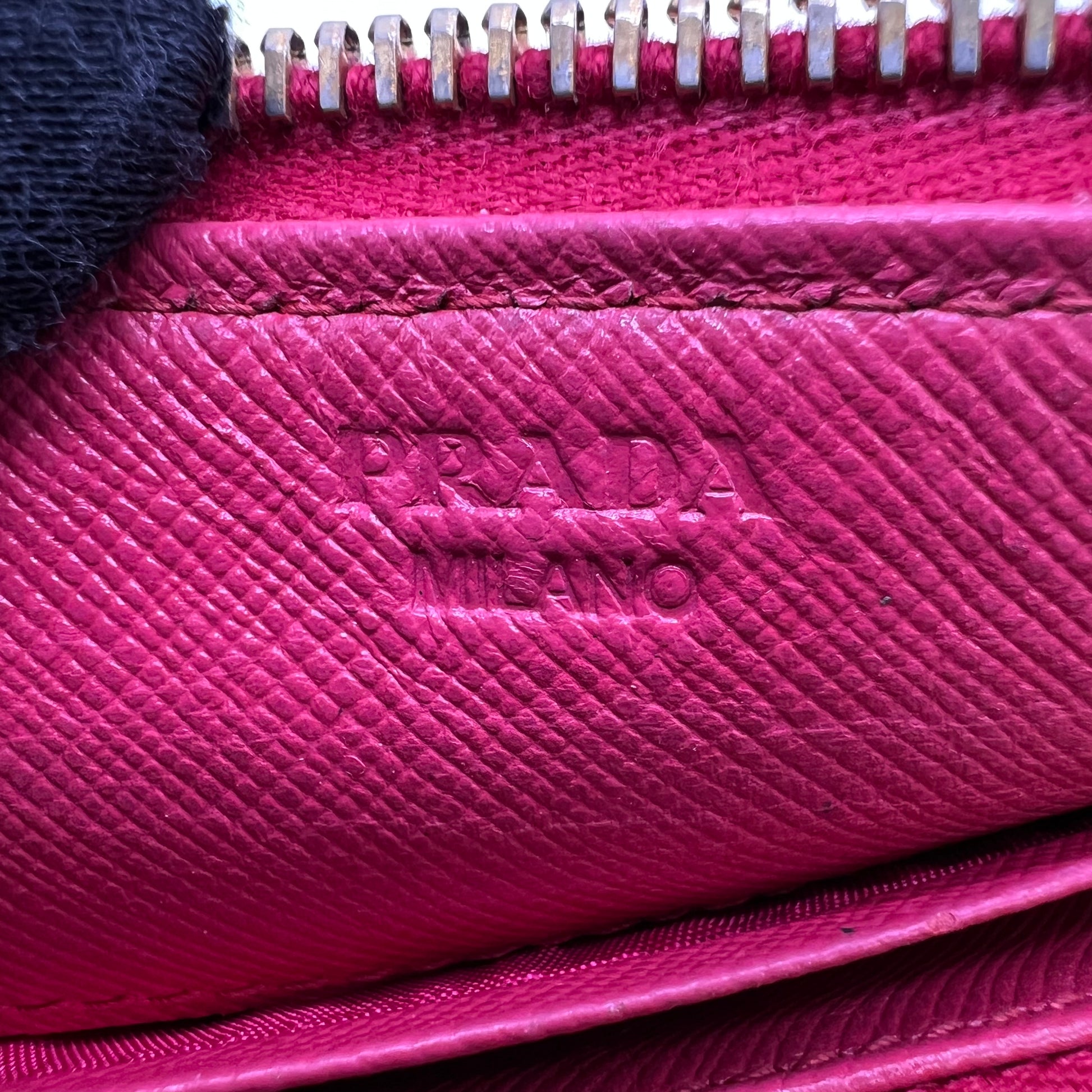 Prada Saffiano Metal Triangle Zippy Wallet W22703