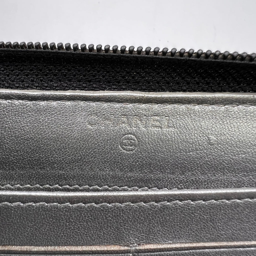 Chanel Camellia Embossed Lambskin Leather Zip Around Long Wallet W22900