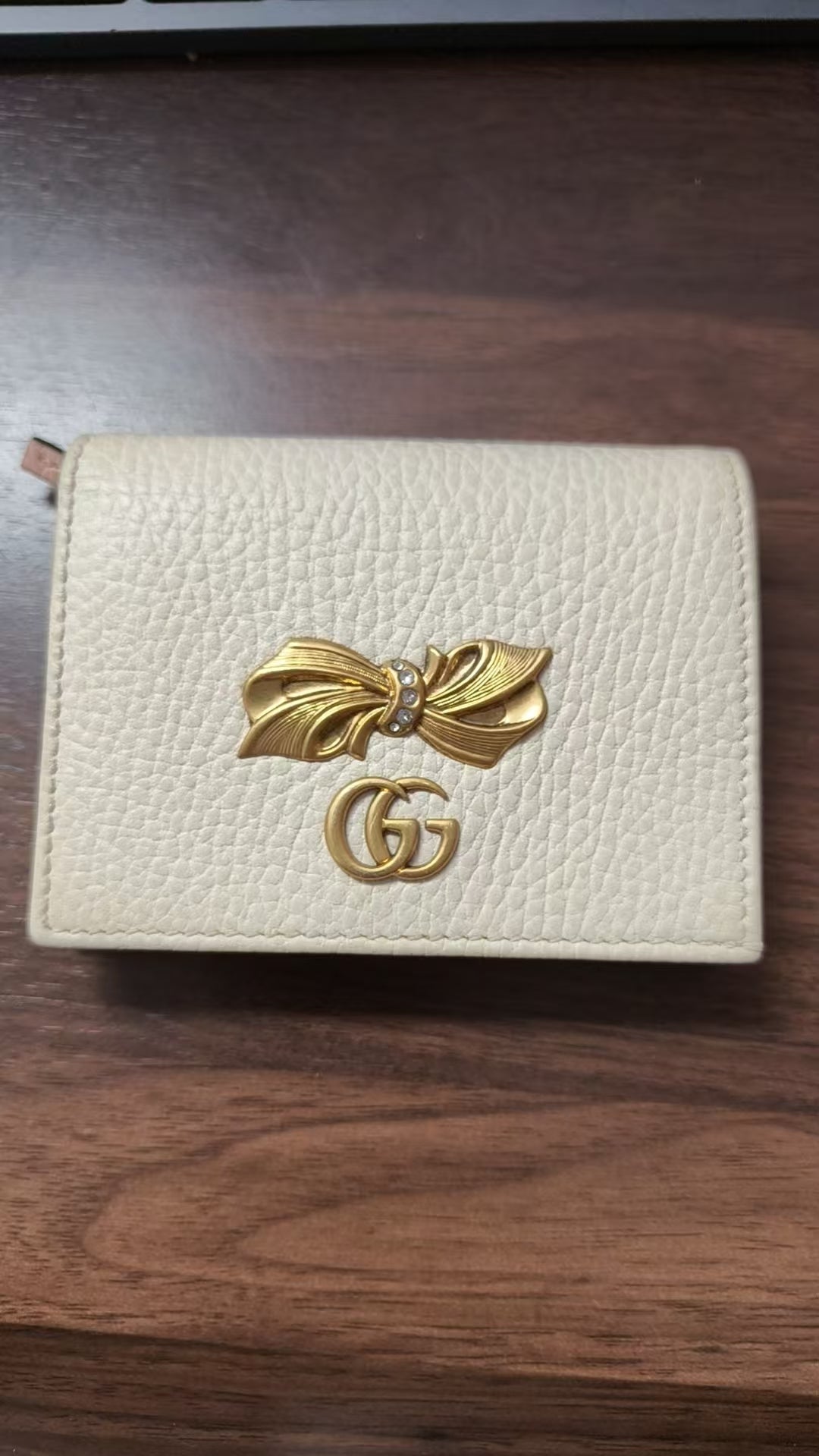 Gucci wallet W23100