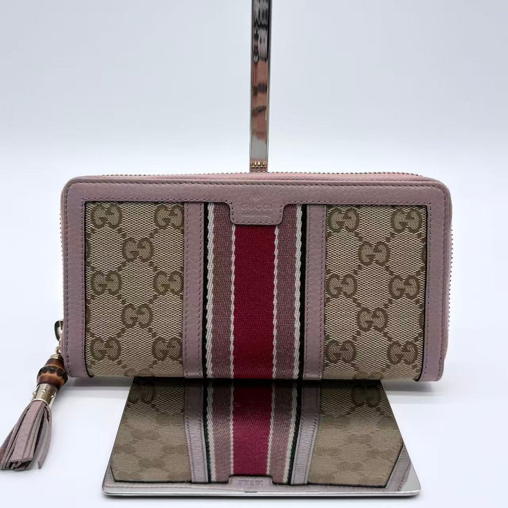 GUCCI Vintage Web Zippy Wallet