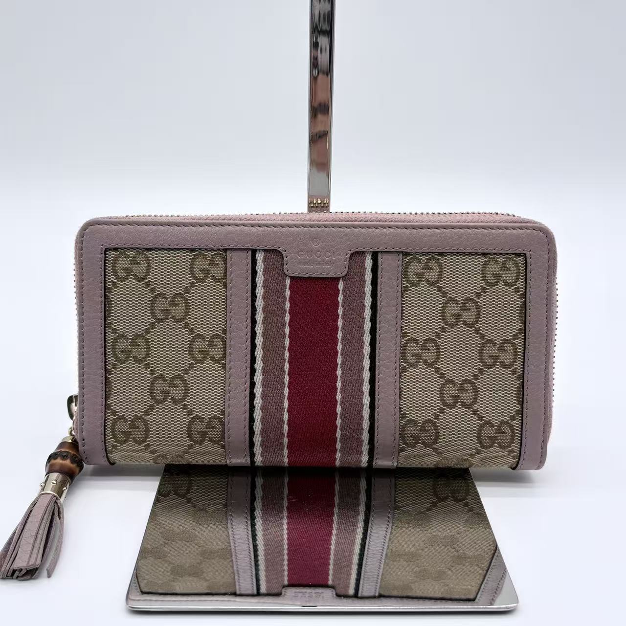 GUCCI Vintage Web Zippy Wallet