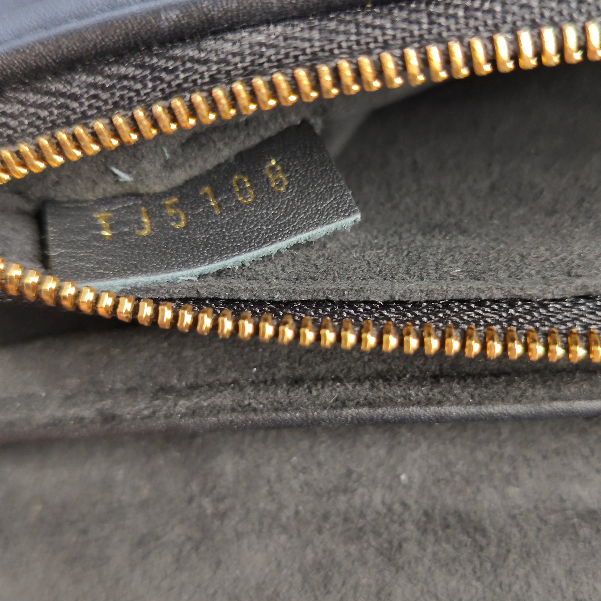 New Wave Chain Pochette Quilted Leather