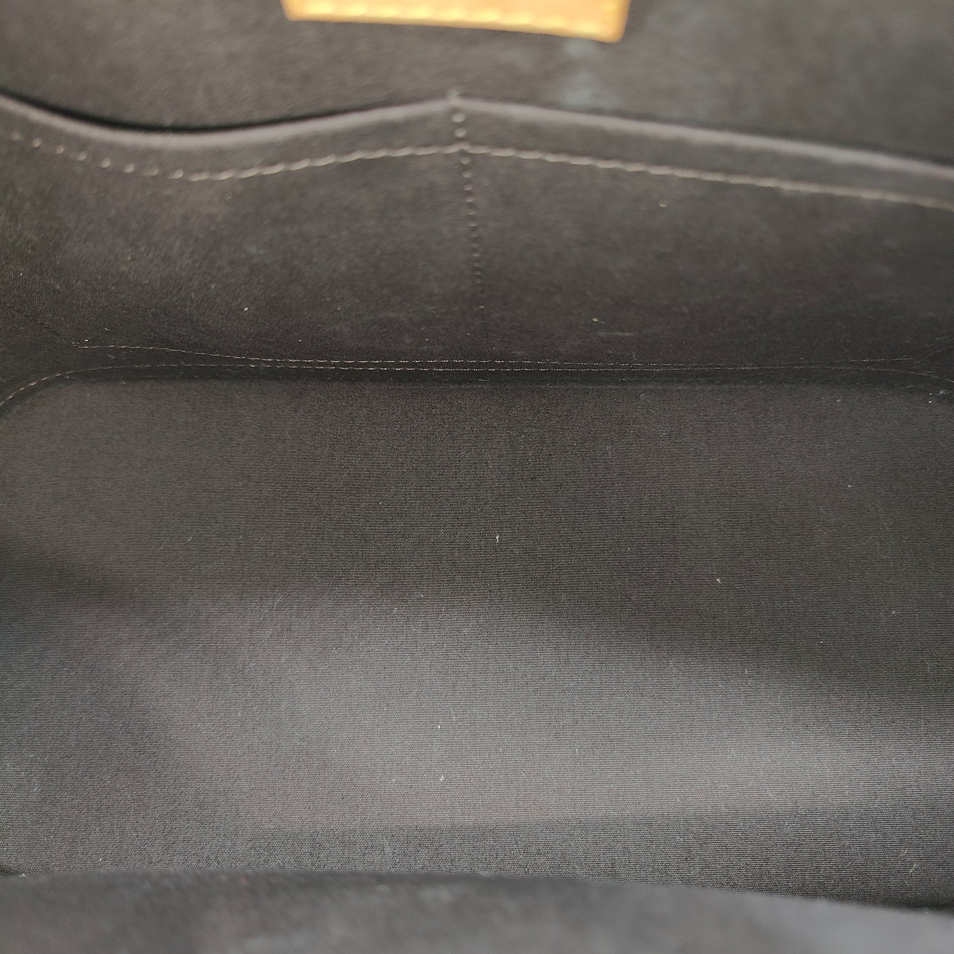 Alma Handbag Monogram Vernis PM