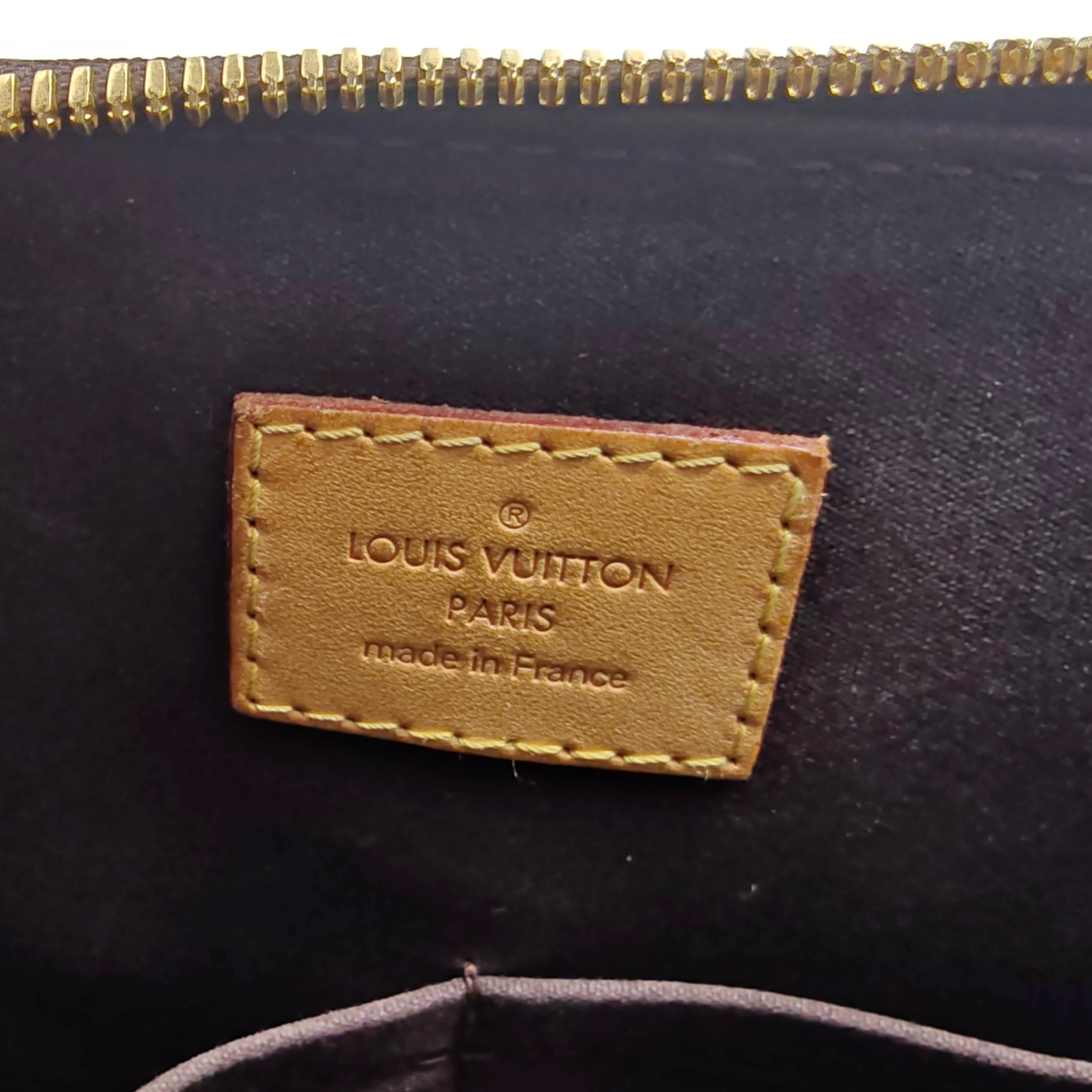 Alma Handbag Monogram Vernis PM
