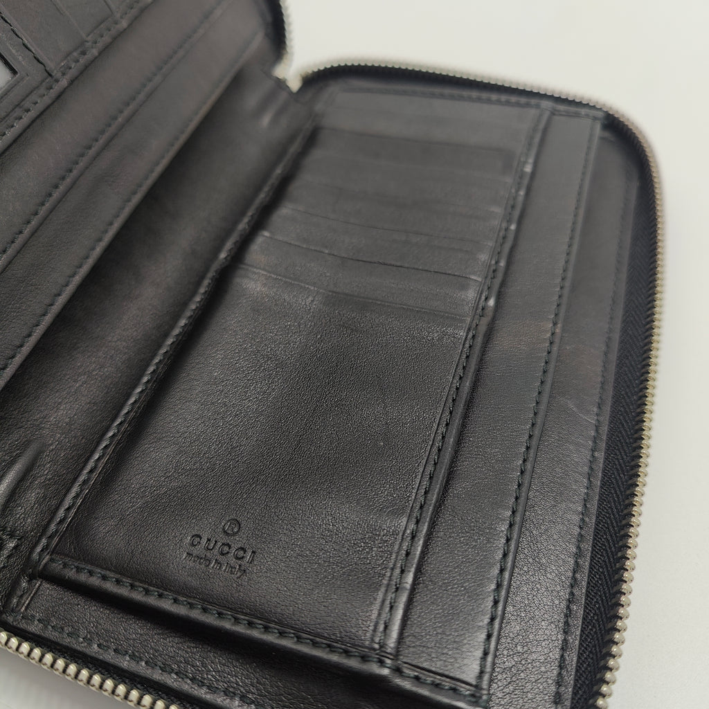 GG Logo Embossed Leather Zipper Long Wallet