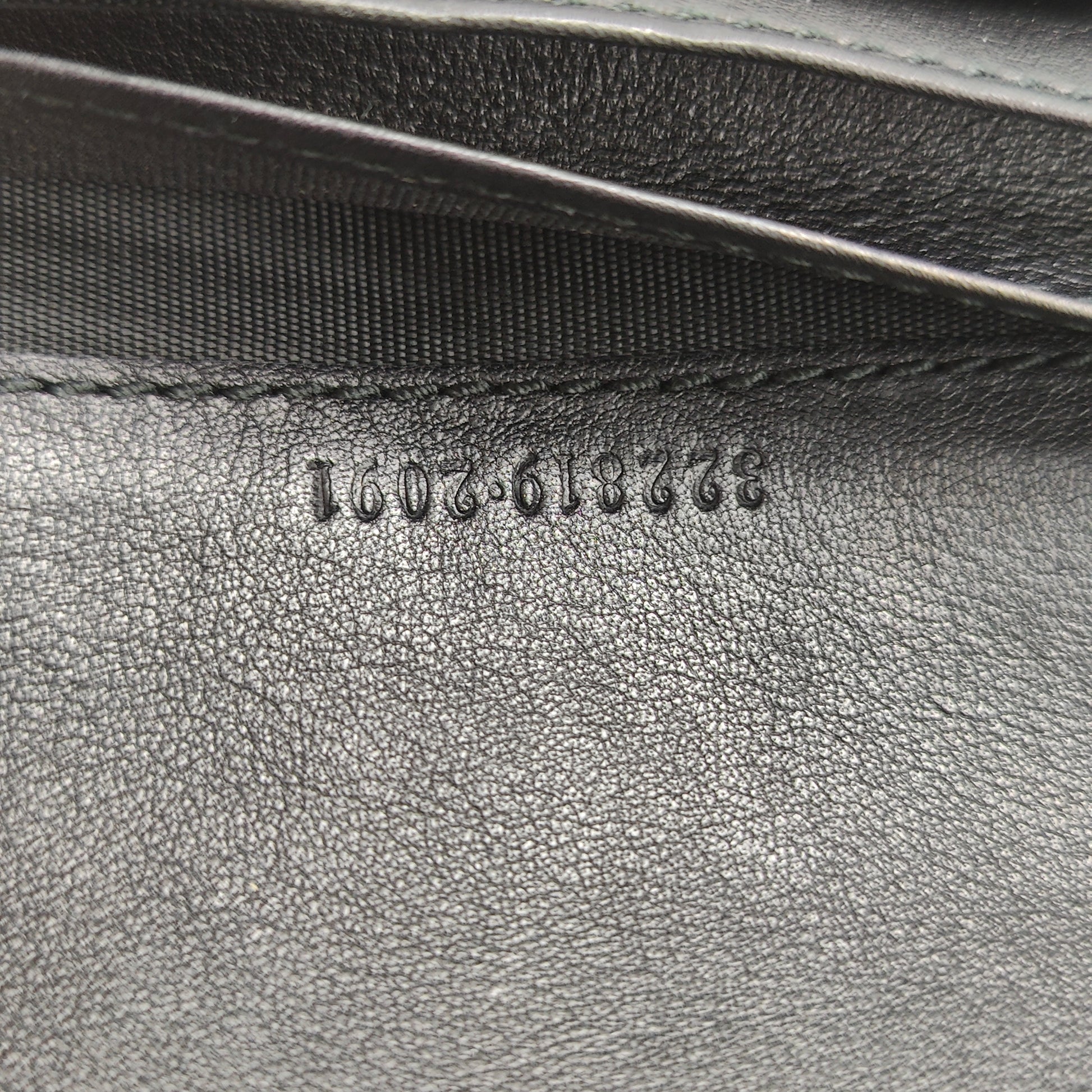 GG Logo Embossed Leather Zipper Long Wallet