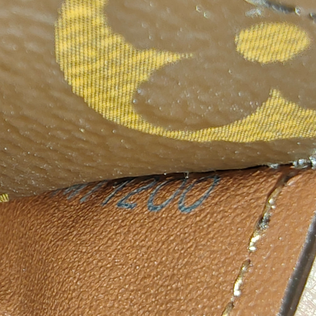 Sarah Wallet NM Monogram Canvas