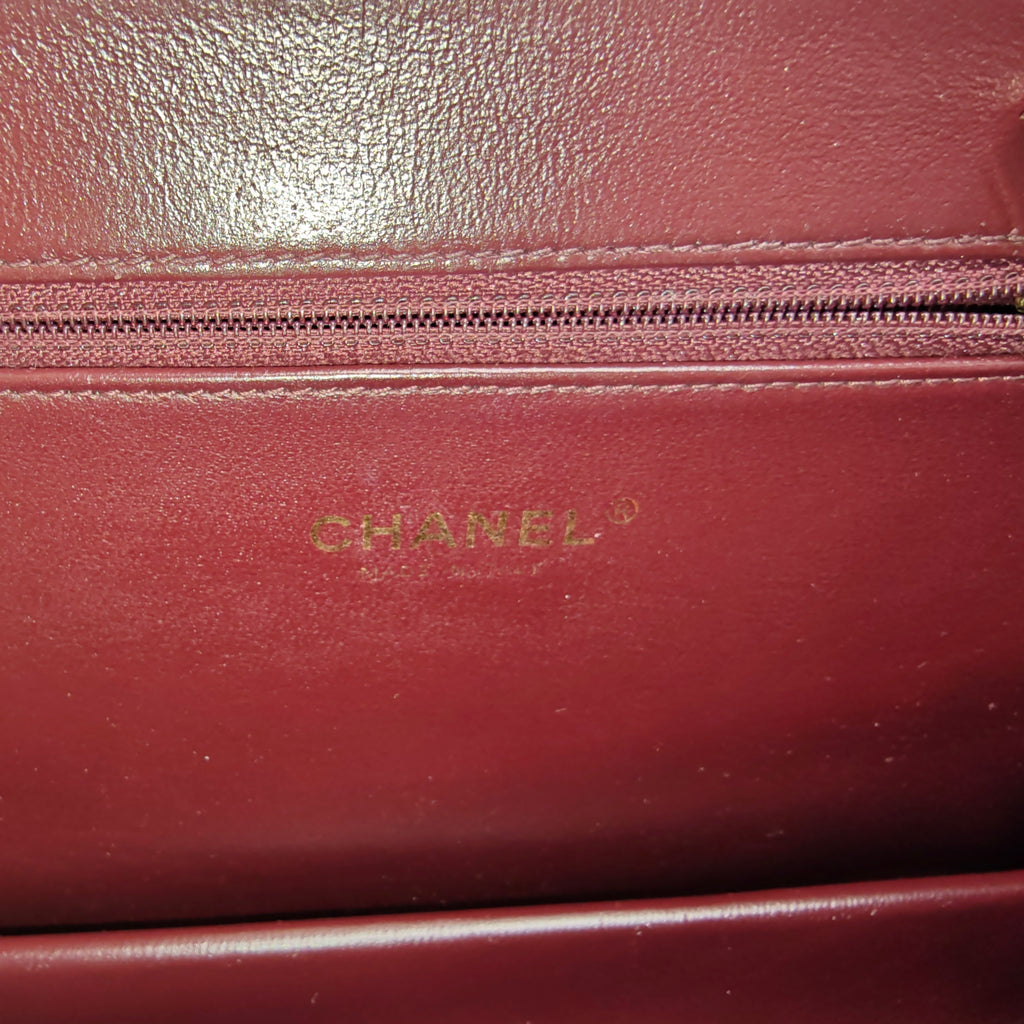 Chanel Quilted Plate Lock Flap Bag