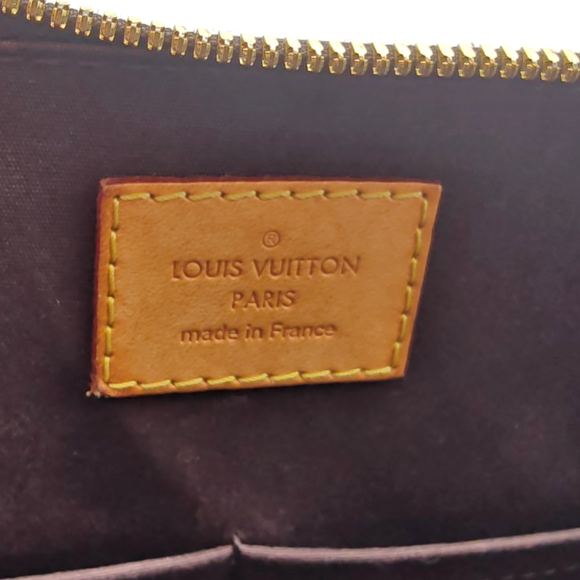 Alma Handbag Monogram Vernis PM