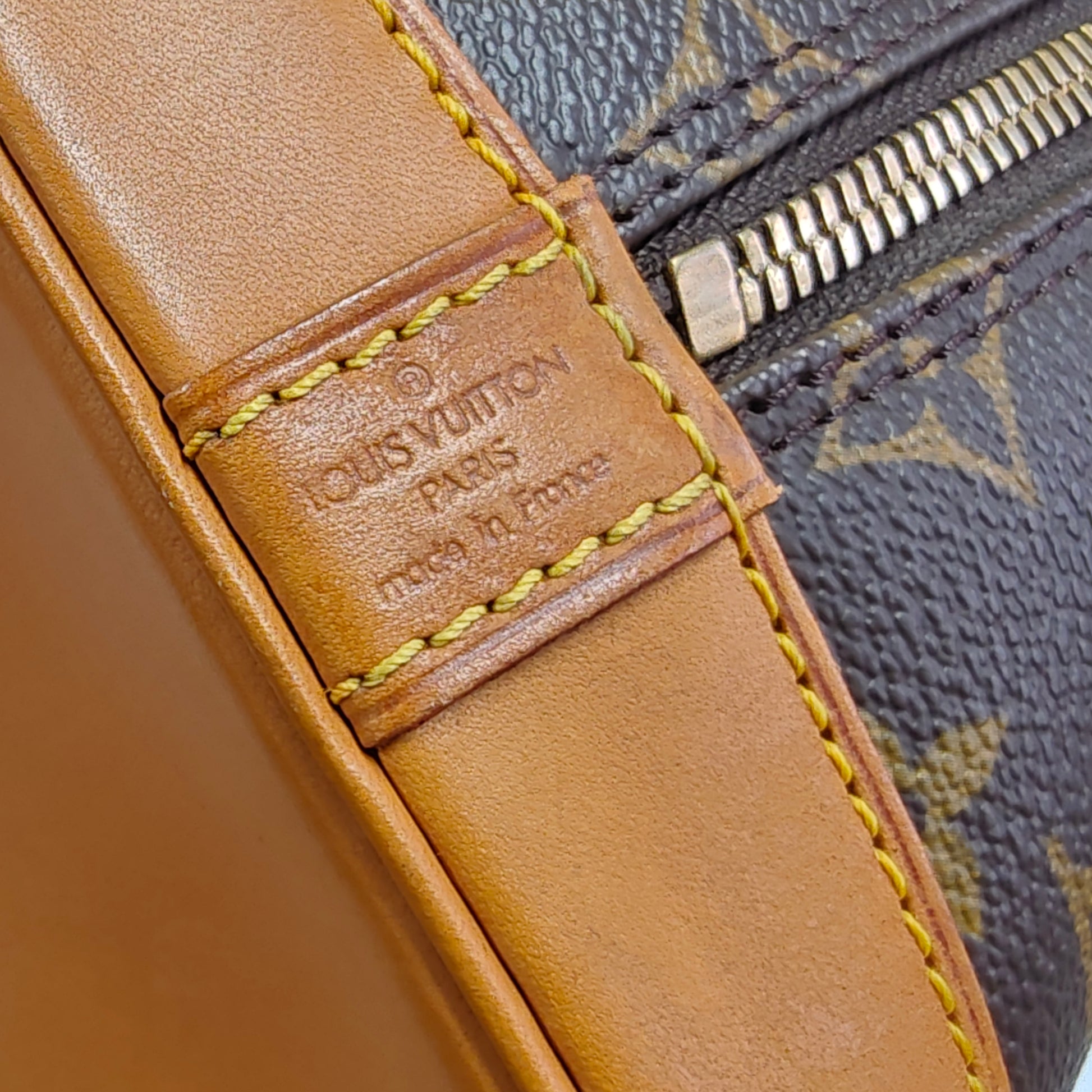 Alma Handbag Monogram Canvas PM Twins