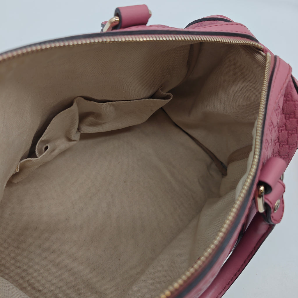 Joy Boston Bag Microguccissima Leather Medium