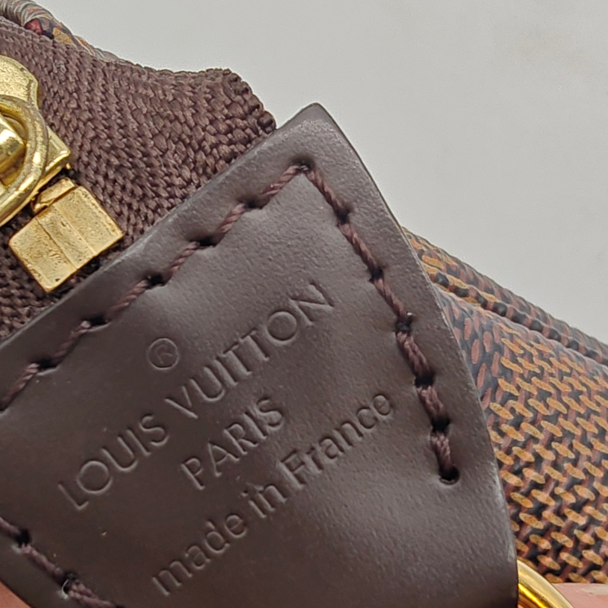 Damier Ebene Mini Pochette Accessories twins