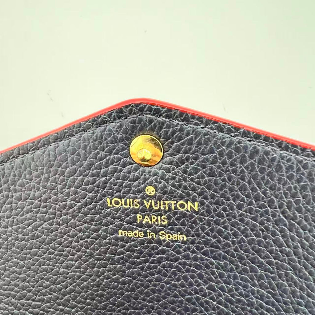Sarah Wallet NM Monogram Empreinte Leather