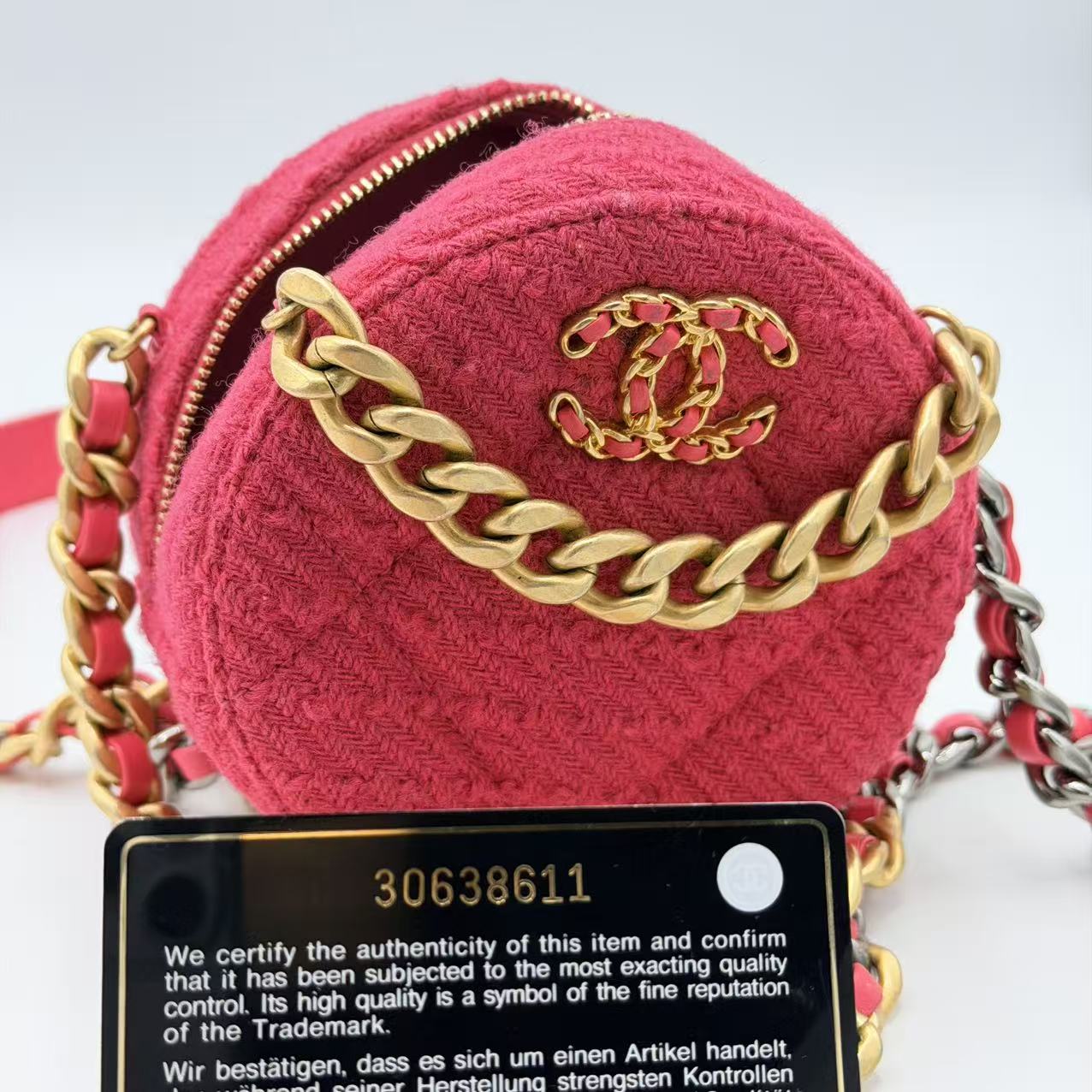 Chanel 19 Round Clutch in pink tweed