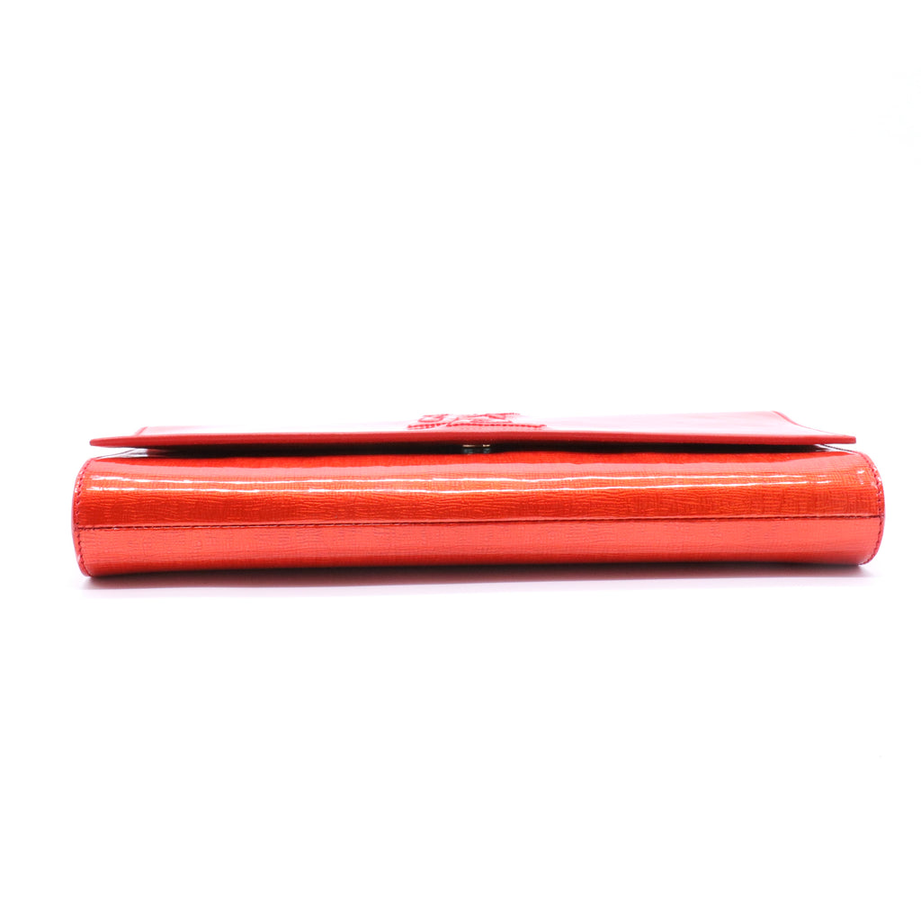 Orange Patent Leather Belle De Jour Clutch twins