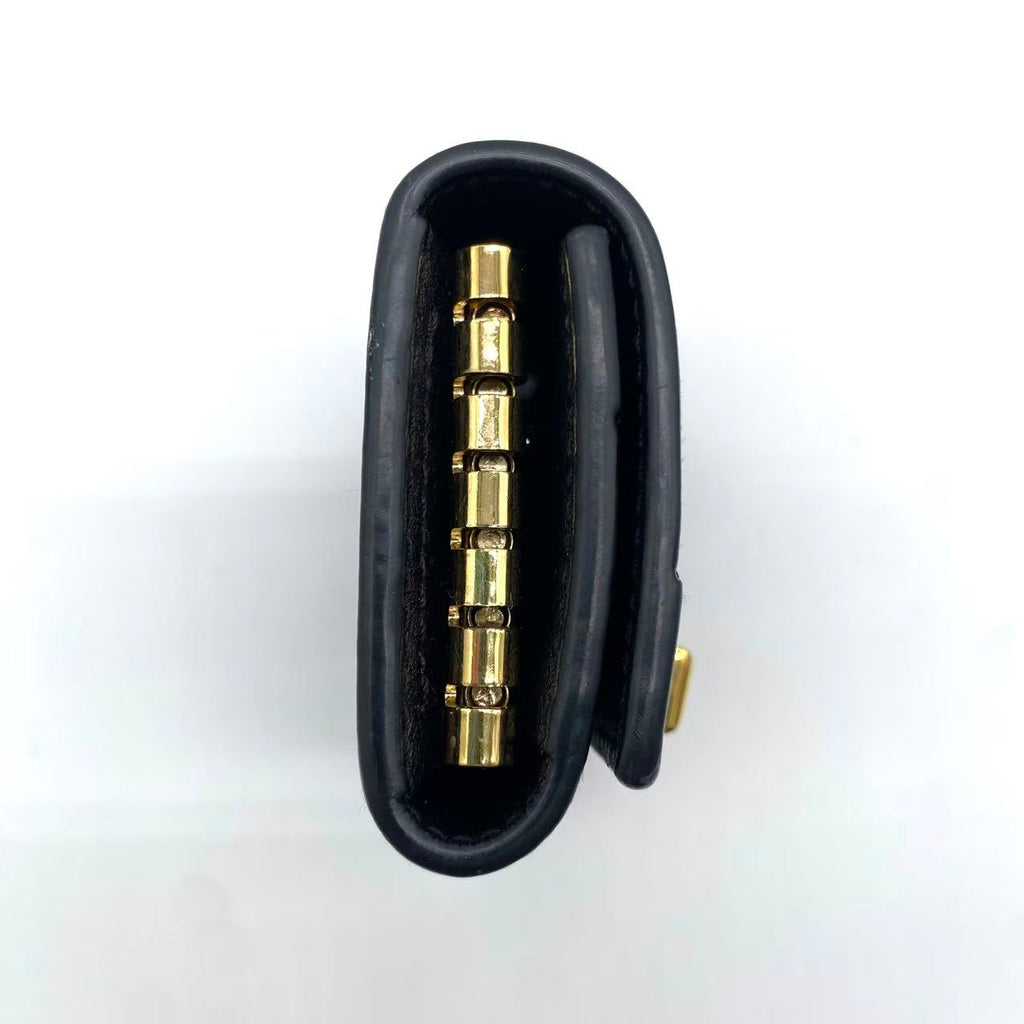 Calfskin GG Monogram Embossed 6 Key Holder Black