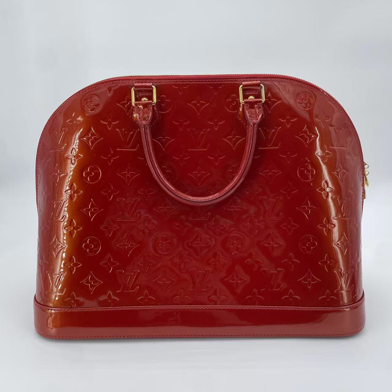 Alma Handbag Monogram Vernis GM
