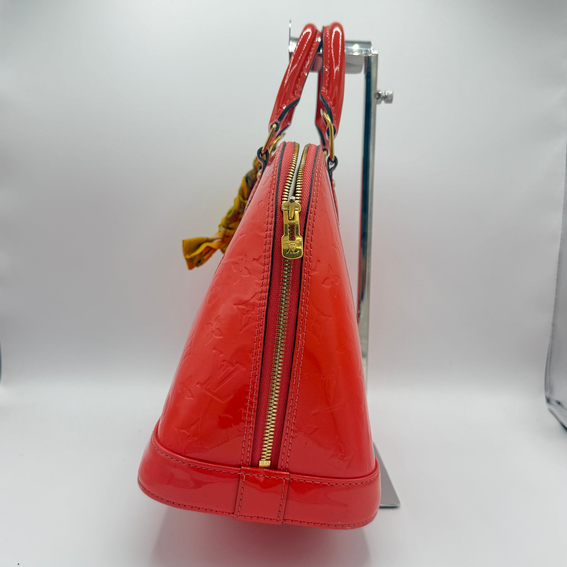Alma Handbag Monogram Vernis PM