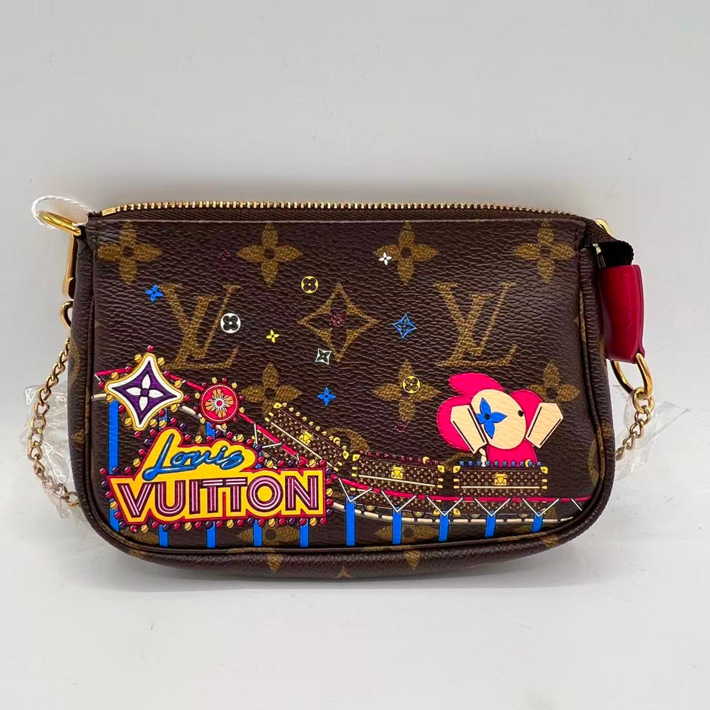 Pochette Accessoires Limited Edition Vivienne Xmas Monogram Canvas Mini