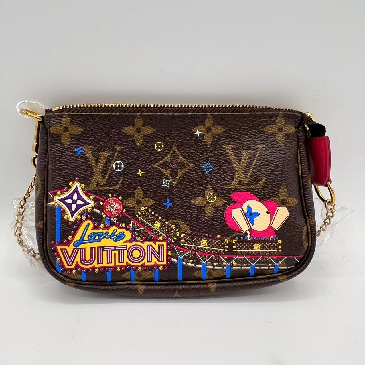 Pochette Accessoires Limited Edition Vivienne Xmas Monogram Canvas Mini