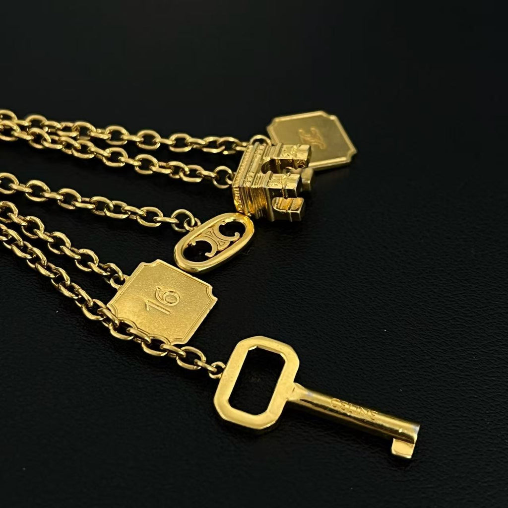 Celine Gold Toned Multichain Triomphe Charm Twins LDJ4255