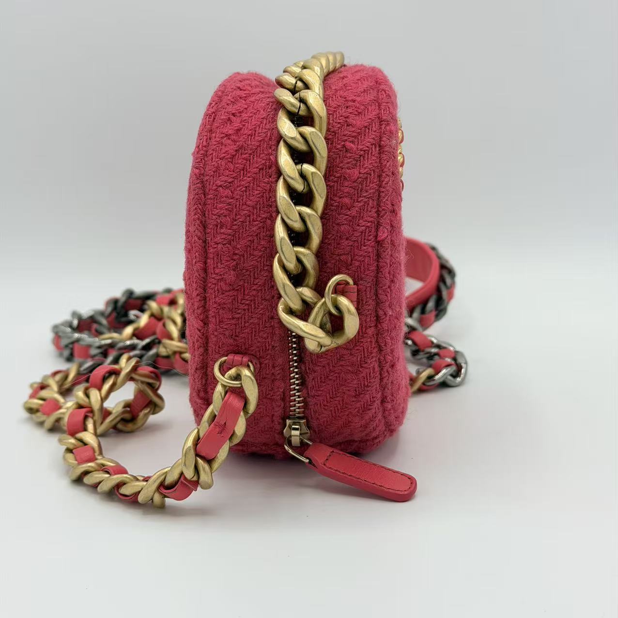 Chanel 19 Round Clutch in pink tweed