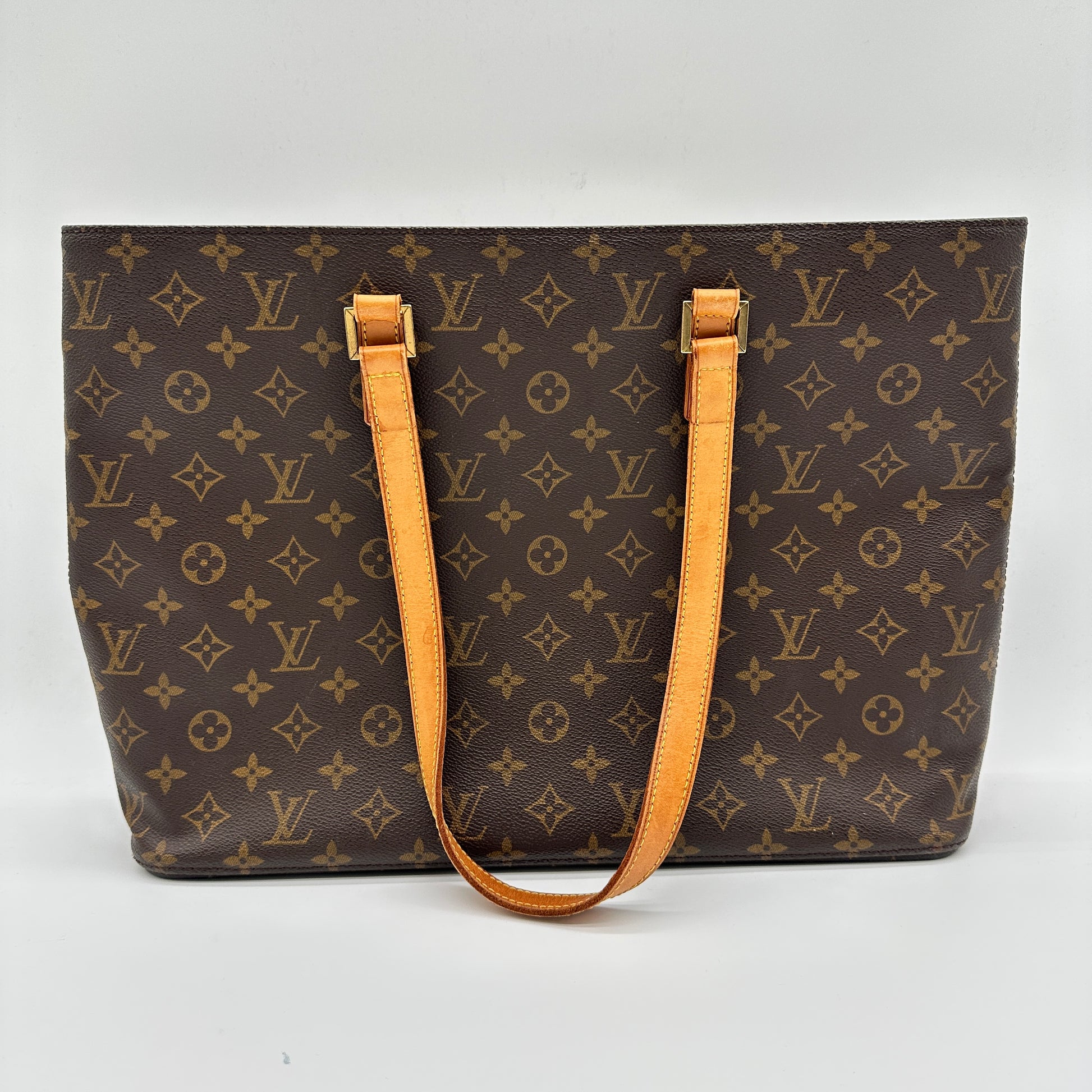 Luco Bag in Monogram Canvas and Tan Leather Trim
