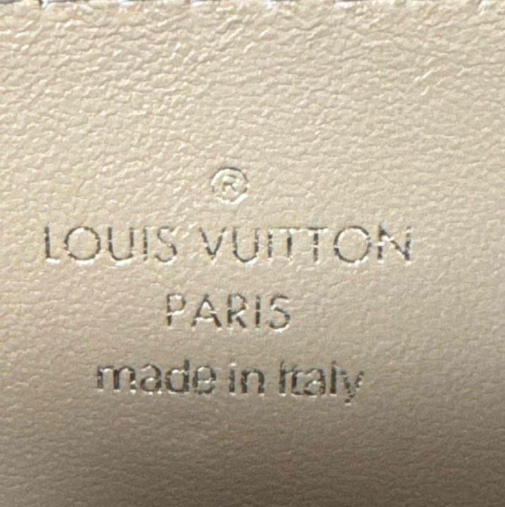 Lambskin Embossed Monogram Pochette Coussin Camel B24552