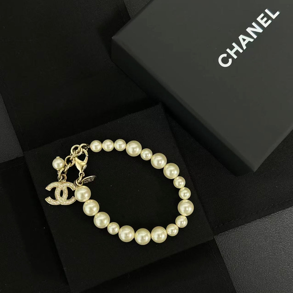 Chanel Faux Pearl and Goldtone CC Charm Bracelet twins LDZ328