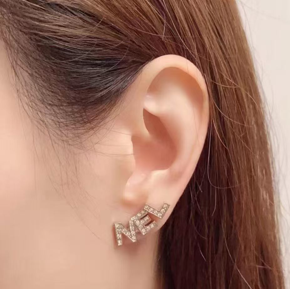 Chanel Signature Stud Earrings Gold Twins LDZ603
