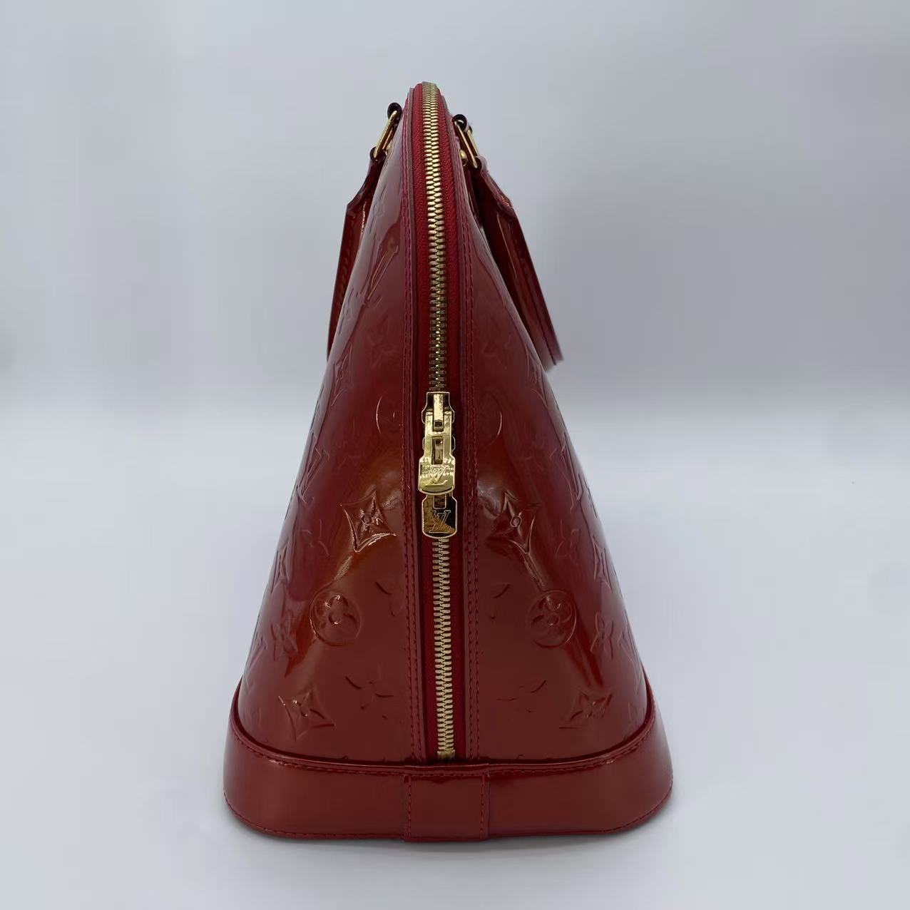 Alma Handbag Monogram Vernis GM
