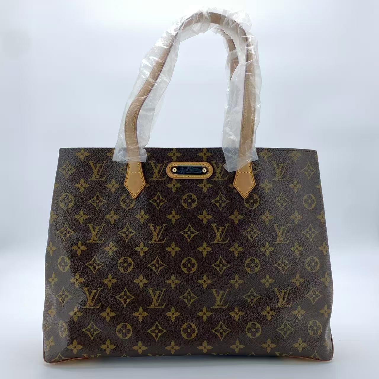 Wilshire Handbag Monogram Canvas MM
