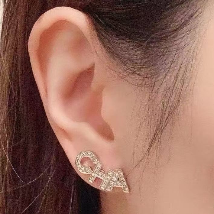 Chanel Signature Stud Earrings Gold Twins LDZ603