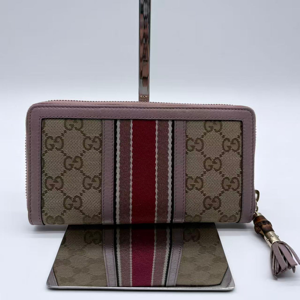 GUCCI Vintage Web Zippy Wallet