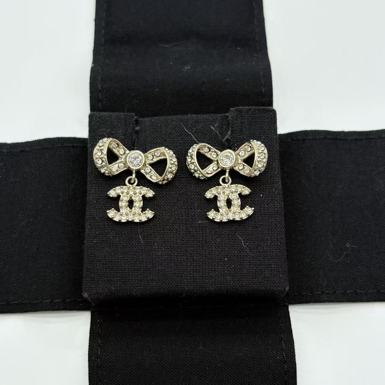 Crystal CC Bow Dangle Earrings Gold