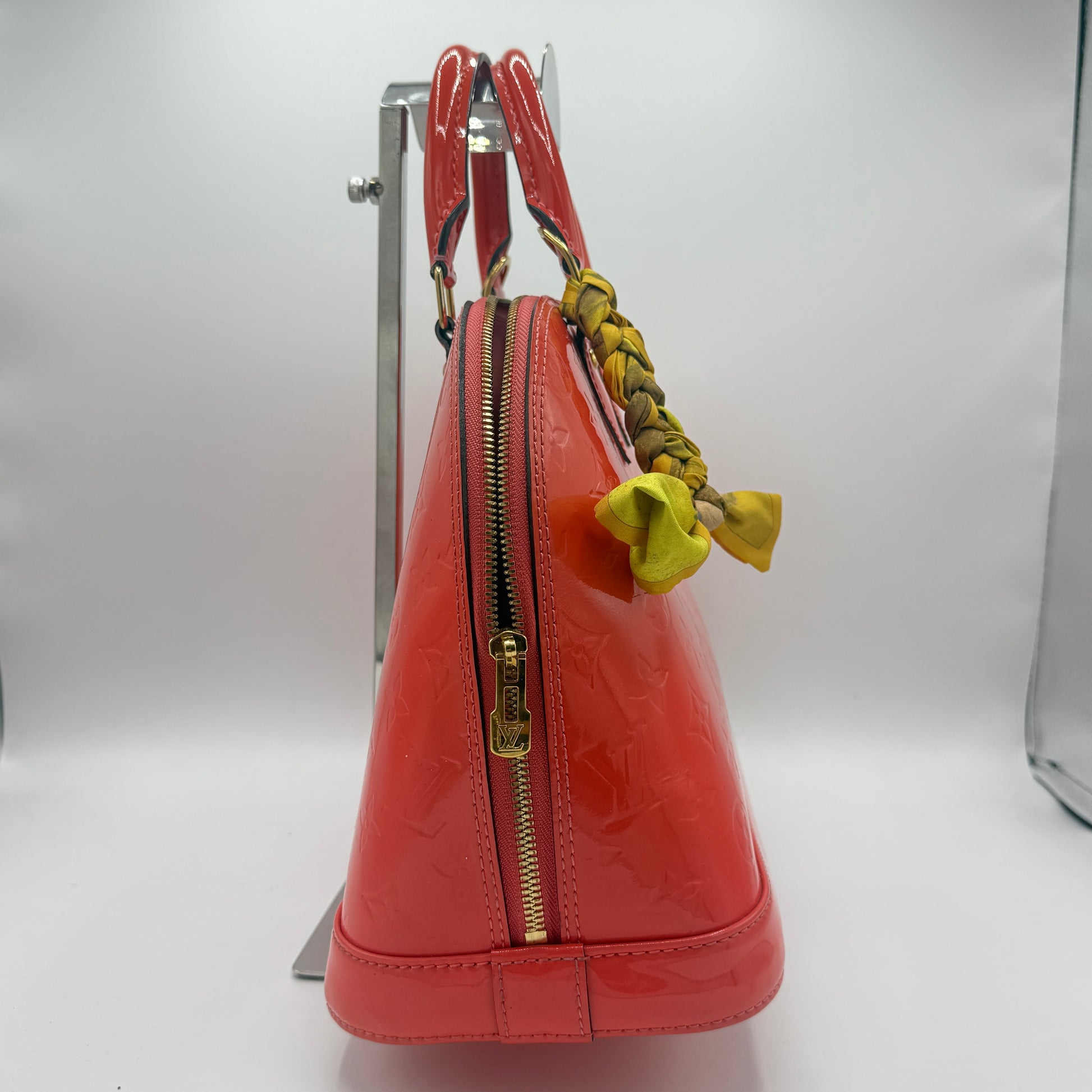 Alma Handbag Monogram Vernis PM