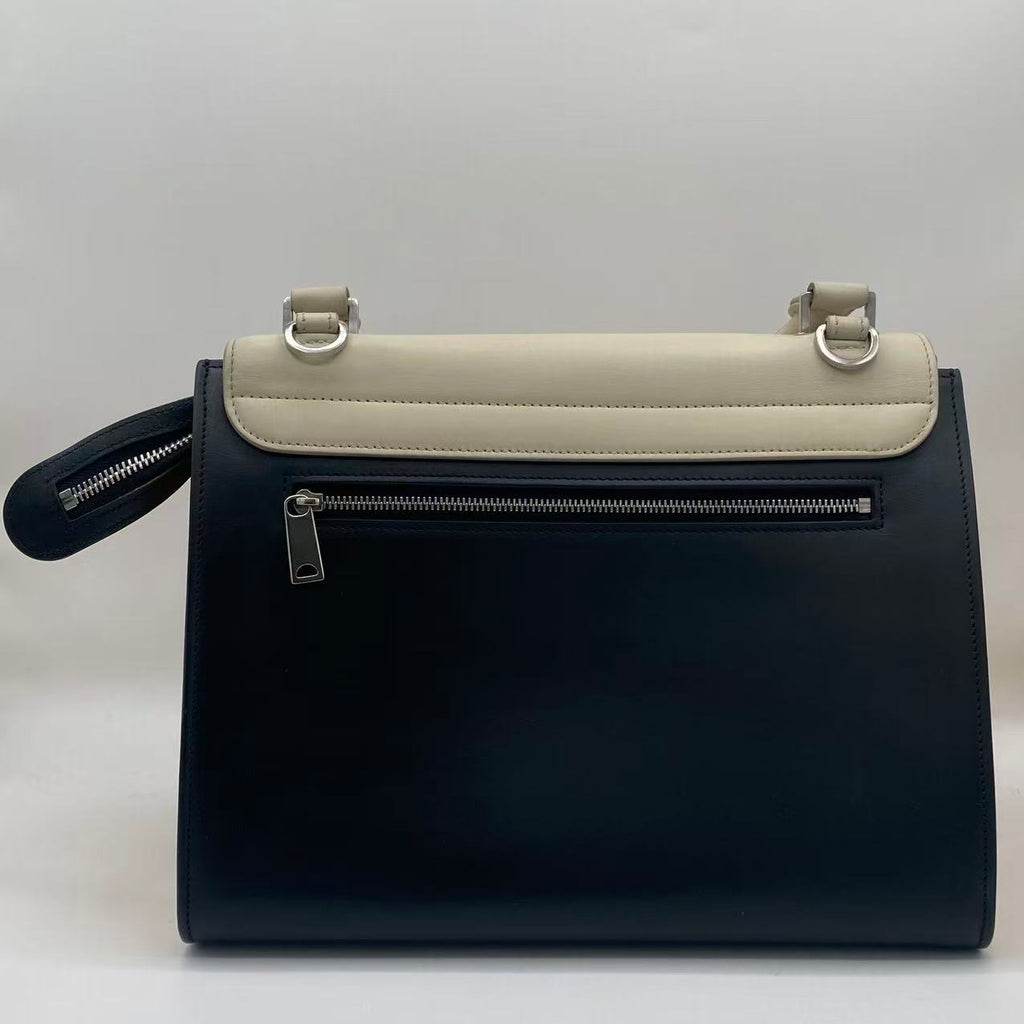 Trapèze leather handbag
