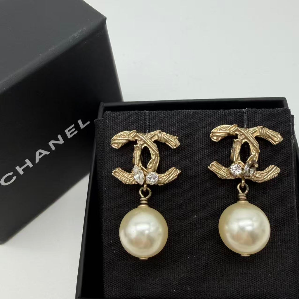 Chanel light gold earrings twins LDJ4169