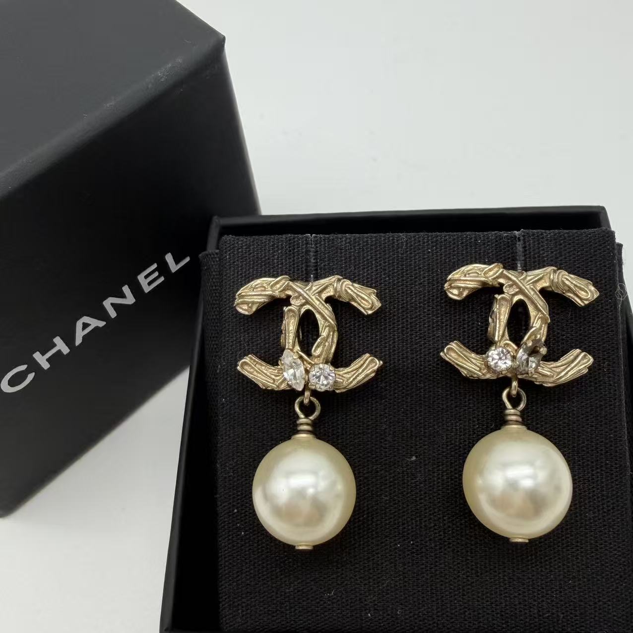 Chanel light gold earrings twins LDJ4169