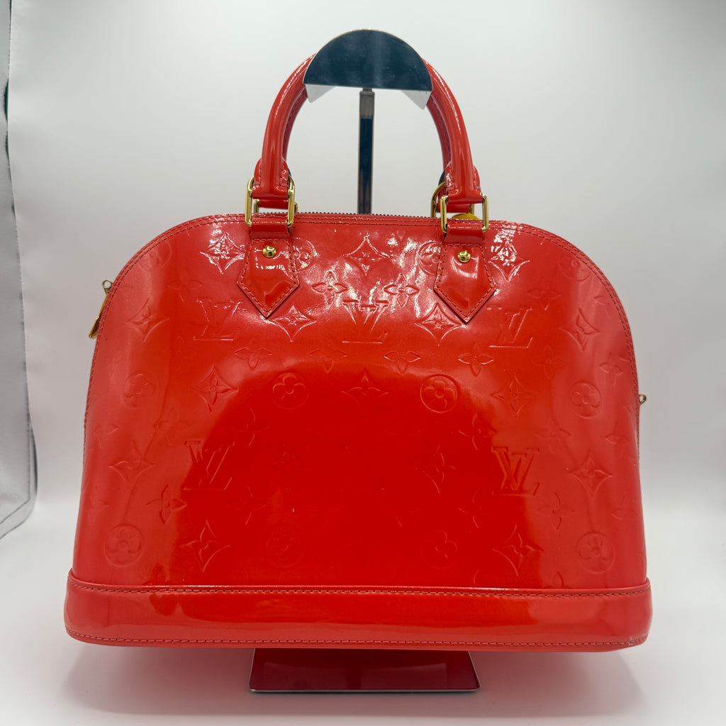 Alma Handbag Monogram Vernis PM
