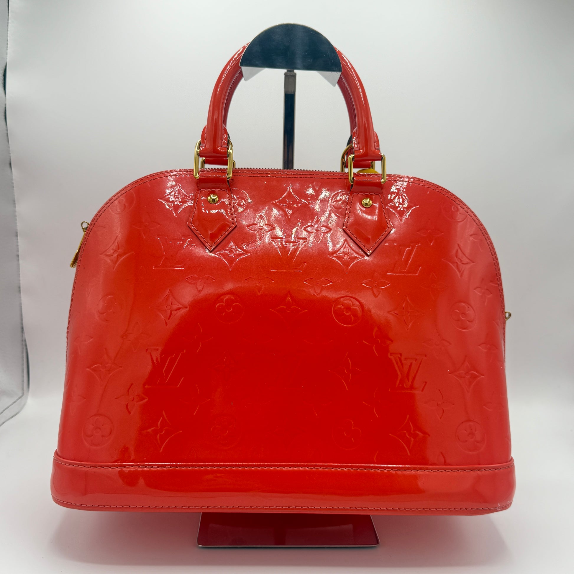 Alma Handbag Monogram Vernis PM