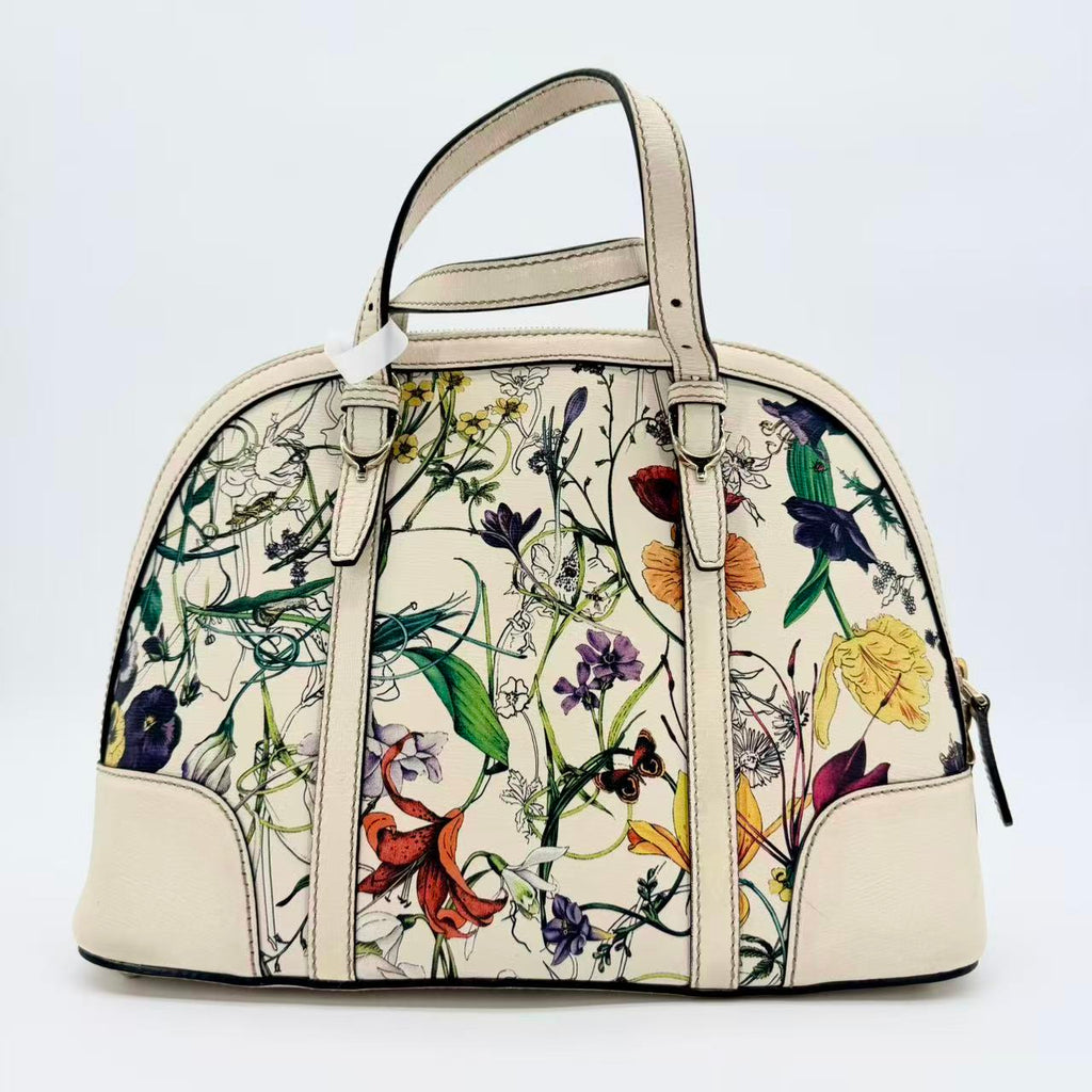 Flora Nice Dome Satchel in white with a multicolour floral print