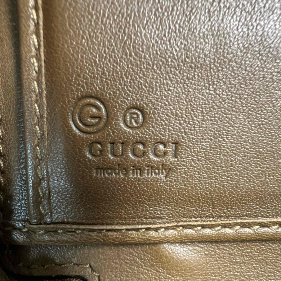Gucci Microguccissima Leather Zip-Around Wallet W23263