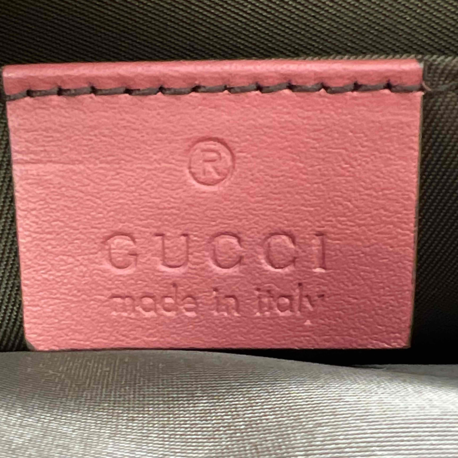 Gucci GG Supreme Clutch W23391