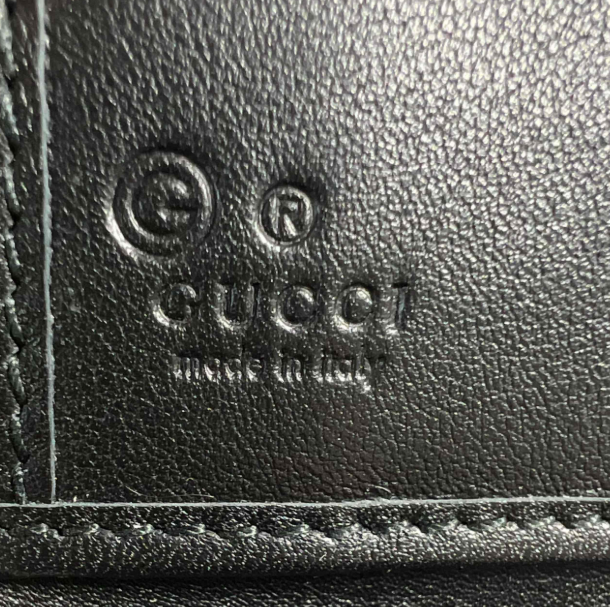 Gucci Microguccissima Zip-Around Wallet W23309
